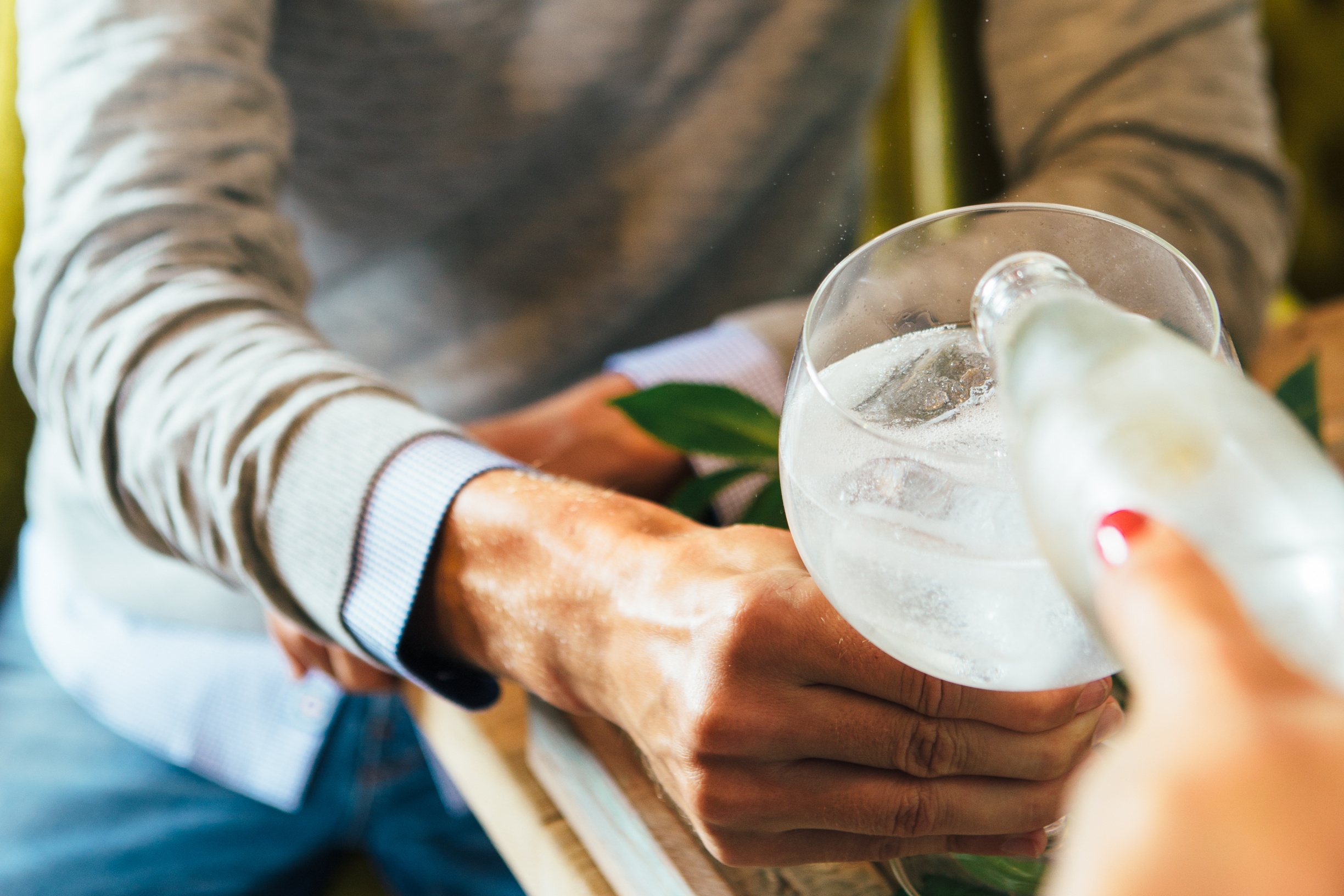 Marlish water being poured in to a glass